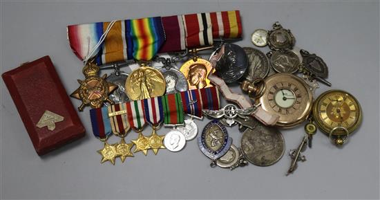 A WWI medal group to SJT. T.H. Field, Welsh regt. together with coins, medallions and two pocket watches.